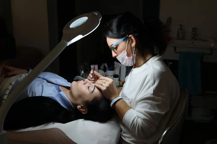 Close-up of a brow shaping treatment