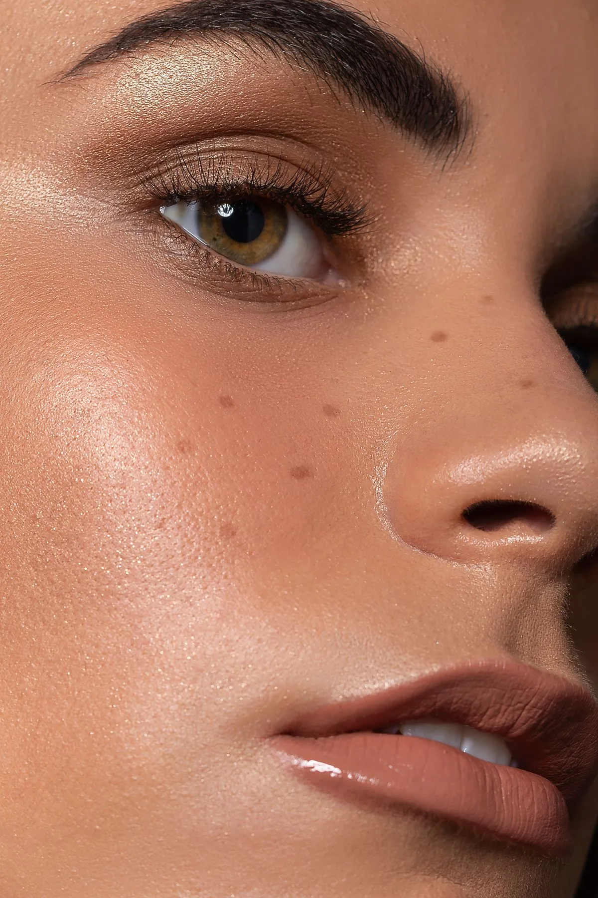 Close-up of skin shown with a duller, less even finish