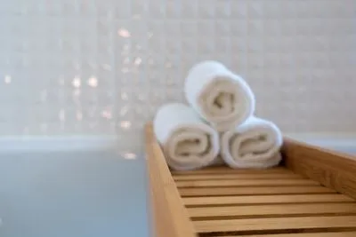 Treatment room detail with folded linen