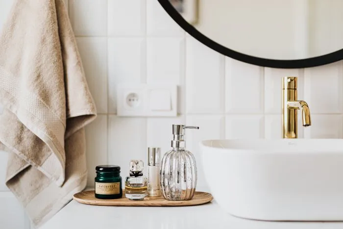 Skincare products arranged on a stone counter