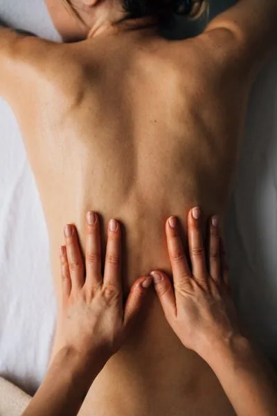 A back massage in progress